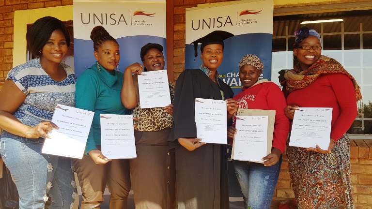 Atteridgeville community participants with certificates of attendance